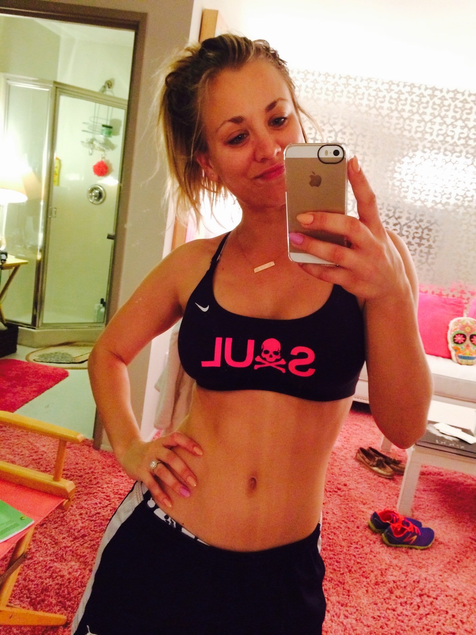 celebrity kaley cuoco takes a stomach pic in the mirror