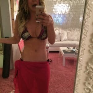 actress kaley cuoco takes a mirror pic in bikini top