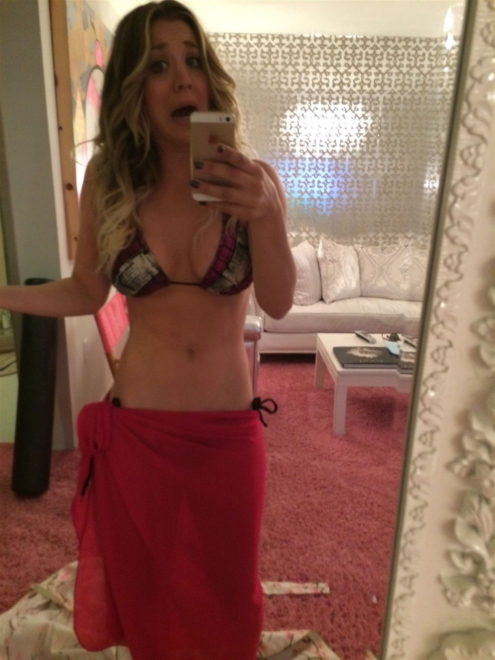 actress kaley cuoco takes a mirror pic in bikini top